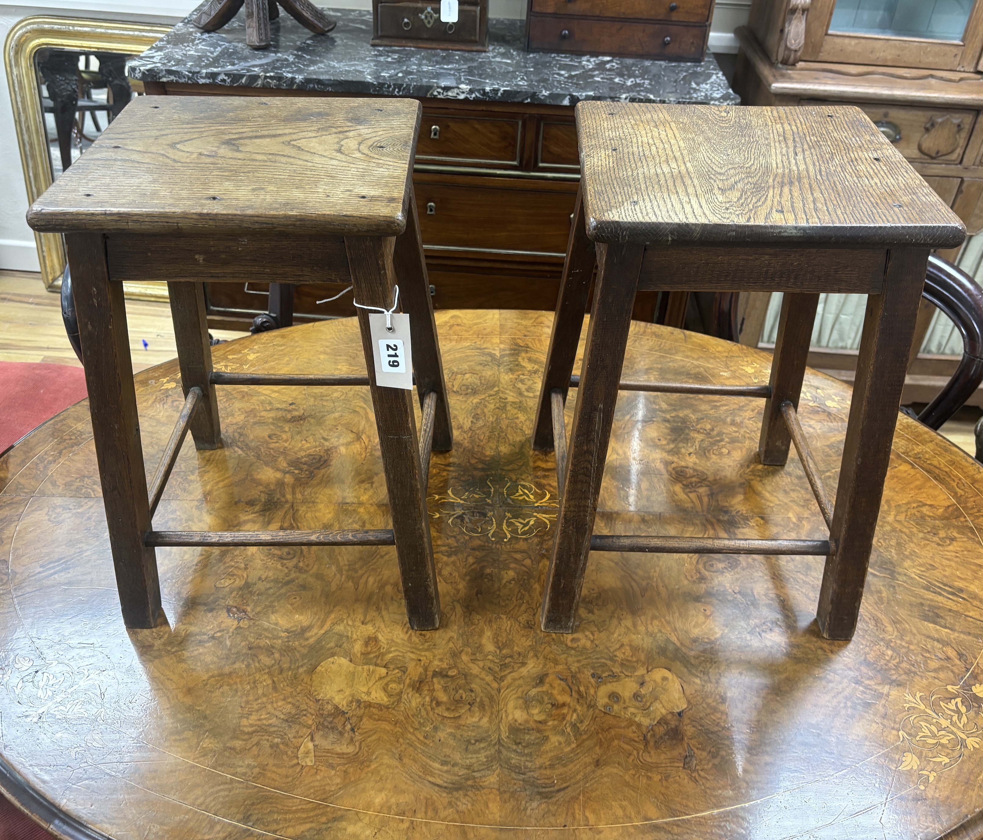 A pair of 19th century Provincial square oak stools, width 30cm, height 46cm